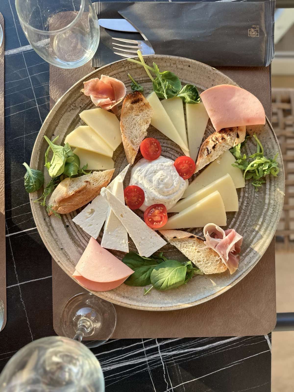 Cheese and charcuterie platter at Tramonto Santorini